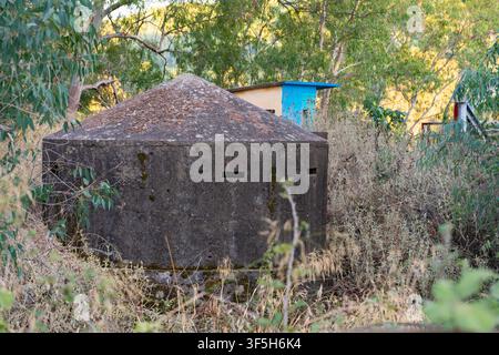 Concrete bunker in Alfios (Alfeios) old railway bridge near Alfiousa (Alfeiousa), Peloponnese, Greece Stock Photo