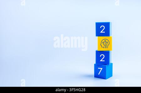 Blue and yellow blocks form 2027 with a digital intelligence icon replacing zero, representing AI strategy, innovation, technology adoption, future pl Stock Photo
