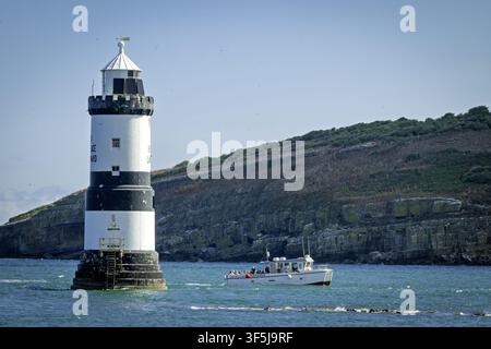 The lighthouse Penmon point on the Isle of Anglesey in North Wales near Puffin Island. Stock Photo