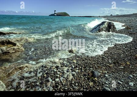 The rocky beach at Penmon point on the Isle of Anglesey in North Wales. Stock Photo