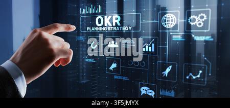 OKR planning strategy system for business performance management with interactive digital interface Stock Photo
