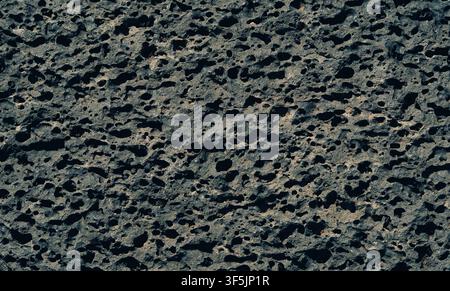 Close-up of porous volcanic lava rock texture in Lanzarote, Canary Islands. Stock Photo