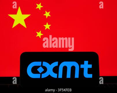 CXMT logo displayed on a smartphone against the national flag of China in a semiconductor industry illustration. Stafford, United Kingdom, August 2, 2 Stock Photo