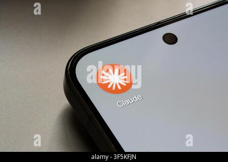 Claude app logo displayed in close up on a smartphone screen in an artificial intelligence technology illustration. Stafford, United Kingdom, August 2 Stock Photo