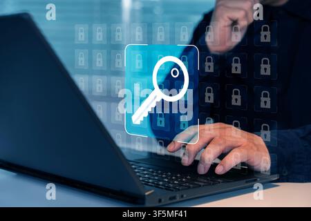 Close-up of a person using a laptop with floating key and padlock icons, illustrating cybersecurity, password protection, data access, authentication, Stock Photo