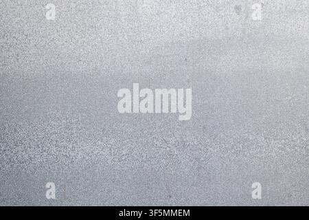 Flat textured surface background of a galvanized steel metal sheet with fine silver zinc spangle grain patterns for industrial design projects. High Quality Photo Stock Photo