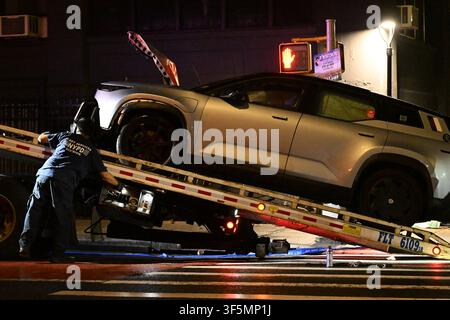 NYPD officers work the scene where a 31-year-old woman is in critical condition after she was struck by a 39-year-old man driving a 2003 Gray Fisker at Park Avenue and Nostrand Avenue within the confines of the 79 precinct in Brooklyn, New York, United States on Sunday, August 2, 2026. Sunday evening at approximately 9:11 pm, police responded and upon arrival it was determined that a 39-year-old man operating a 2003 Gray Fisker was traveling westbound on Park Avenue and attempting to turn onto Nostrand Avenue when he collided with a grey Honda minivan. The 2003 Gray Fisker then jumped the curb Stock Photo