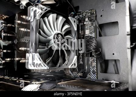 Urdorf, Switzerland, July 29,2026. Wide interior view of a custom-built desktop PC case highlighting the Scythe CPU cooling tower, Kingston Fury Beast Stock Photo
