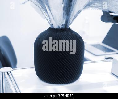 Art model printed on 3D printer. Object created on 3D printer from molten plastic. 3D printed creative object. Modern new modern additive progressive technologies. 3D printing technology Stock Photo