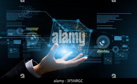 Unrecognizable businessman holding cubic hologram with digital user interface elements, collage in futuristic style Stock Photo