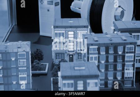 Art models buildings printed on 3D printer. Different objects created on 3D printer from molten plastic. 3D printed different objects. Modern new modern additive progressive technologies. 3D printing Stock Photo