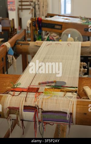 Every employee of the Cité internationale de la tapisserie in Aubusson, France, must try their hand at tapestry weaving. This is one of their efforts. Stock Photo