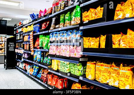 London UK, August 03 2026, Shelves Filled With Marks And Spencer Savoury Snack Multipacks Including Cheese Tasters And Potato Hoops Stock Photo