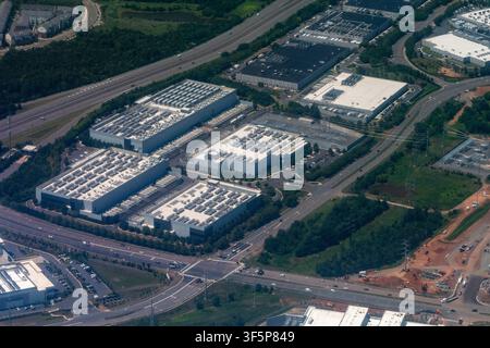 Aerial view of a dense cluster of data centers, including facilities under construction, in Loudoun County's Data Center Alley in Northern Virginia Stock Photo