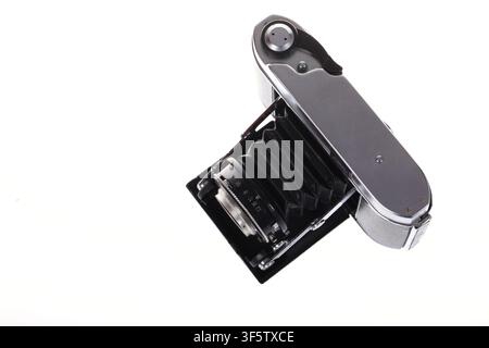 Antique film folding camera isolated on white background Stock Photo