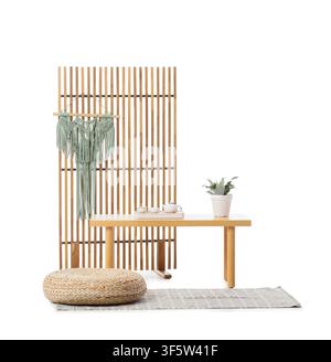 Modern folding screen, bench and pouf isolated on white background Stock Photo