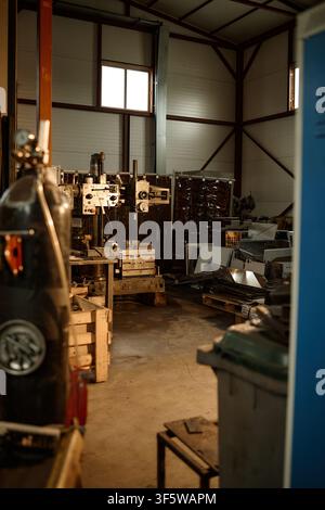 Industrial Metal Workshop with Welding Equipment and Machinery Stock Photo