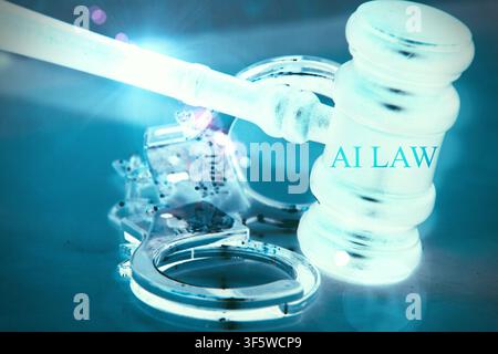 Modern legal technology concept featuring a close-up judge's gavel, metallic handcuffs, and a luminous "AI LAW" sign against a futuristic blue cyber b Stock Photo