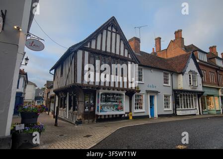 The historic 15th-century timber-framed building of The Corner Cupboard shop on the corner of King Street in Saffron Walden, Essex. Stock Photo
