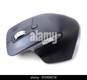 A modern ergonomic wireless computer mouse is isolated against a clean white background Stock Photo