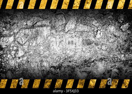 Grunge grey marble background with black and yellow warning stripes Stock Photo