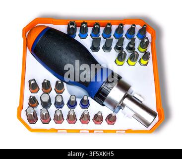 Orange and blue set of screwdriver with ratchet and various attachments isolated on white Stock Photo