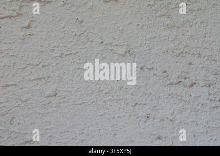 Light relief tile with rough textured surface in close up. Stock Photo