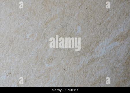 Close up of neutral decorative tile with smooth color variations and a subtle natural finishing material texture Stock Photo