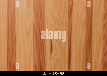 Natural wooden surface of light boards with vertical lines of wood grain. Stock Photo