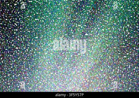 A vibrant abstract background featuring a pointillist style with a gradient transition from dark blue to light green, created with numerous small dots Stock Photo