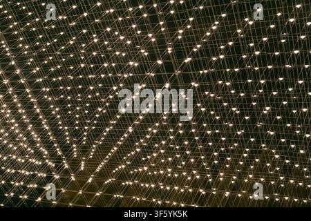 abstract background with lights on the ceiling of a modern office building Stock Photo