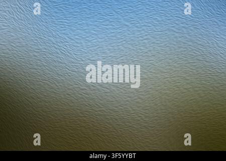 An abstract background featuring a textured surface with a smooth gradient transitioning from light blue at the top to a muted brown at the bottom. Stock Photo
