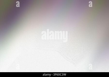 A soft, ethereal background with a light gray and white gradient, featuring a frosted or matte glass texture that creates a clean and minimalist look. Stock Photo