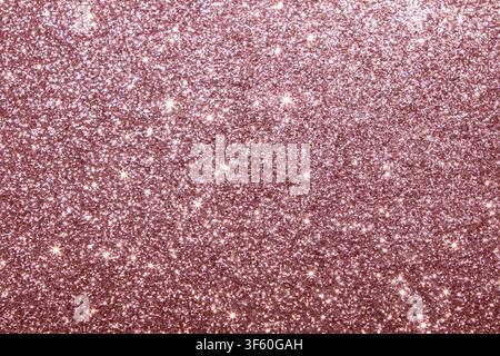 Rose gold glitter background with shimmering sparkle and elegant pink metallic texture Stock Photo