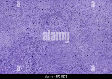 Abstract grunge concrete texture background with different shades of purple color. Painted canvas, stucco rock surface, studio backdrop, grainy effect Stock Photo