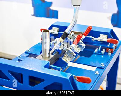 Six-axis welding robot for industry and metal part Stock Photo