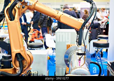 Welding robotic arm manipulator for industry and metal part Stock Photo