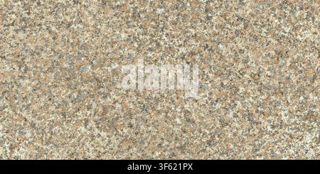 Close-up surface view of a beige and brown speckled granite stone. Stock Photo