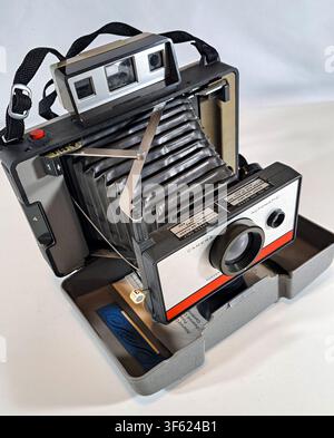 A vintage instant photo camera Stock Photo