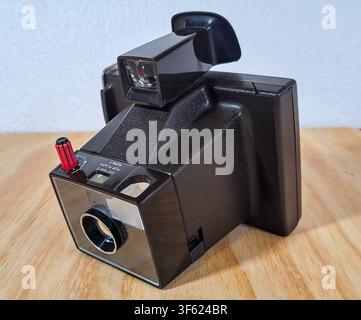 A vintage instant photo camera Stock Photo