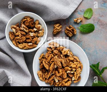 Walnuts without shell on a concrete background Stock Photo