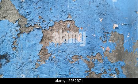 Close view of peeling blue wall with texture details Stock Photo