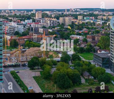 Aerial view of the city of Vilnius featuring modern office buildings, a ...