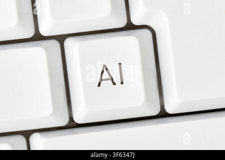 Keyboard key with AI text symbolizing artificial intelligence and digital technology Stock Photo