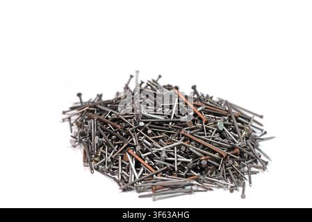 Many different nails against a white background Stock Photo