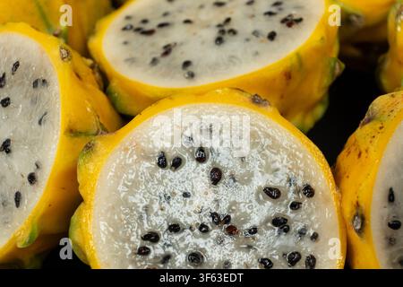 Cut ripe yellow pitahaya fruits close up view Stock Photo
