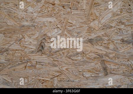 Area with wood chips, wooden wall, full-screen, background image Stock Photo