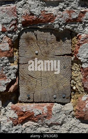 A support beam in old masonry Stock Photo
