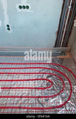 Underfloor surface heating pipes. Low temperature heating concept Stock Photo