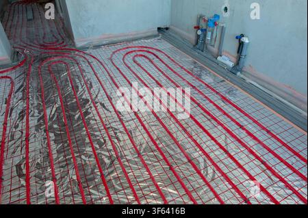 Underfloor surface heating pipes. Low temperature heating concept Stock Photo